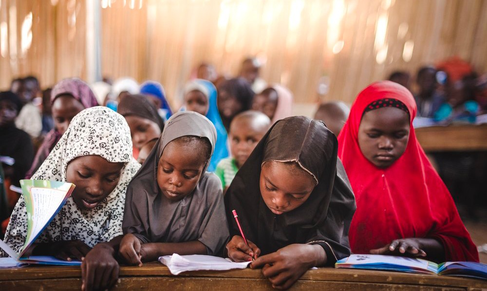 Girls studying in classroom